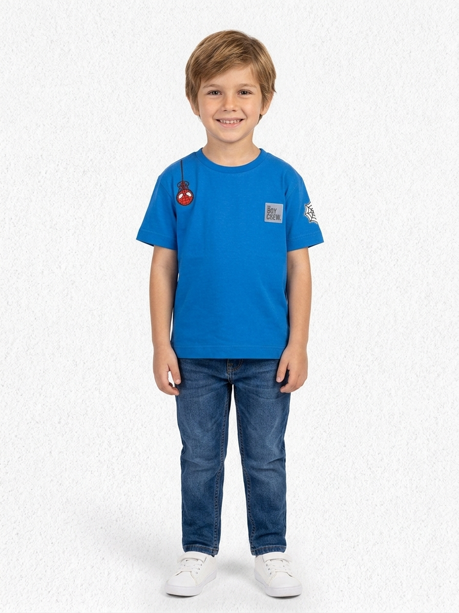 Front and back flat lay of vibrant blue kids tee with spider-man chest patch and bold web graphic on back
